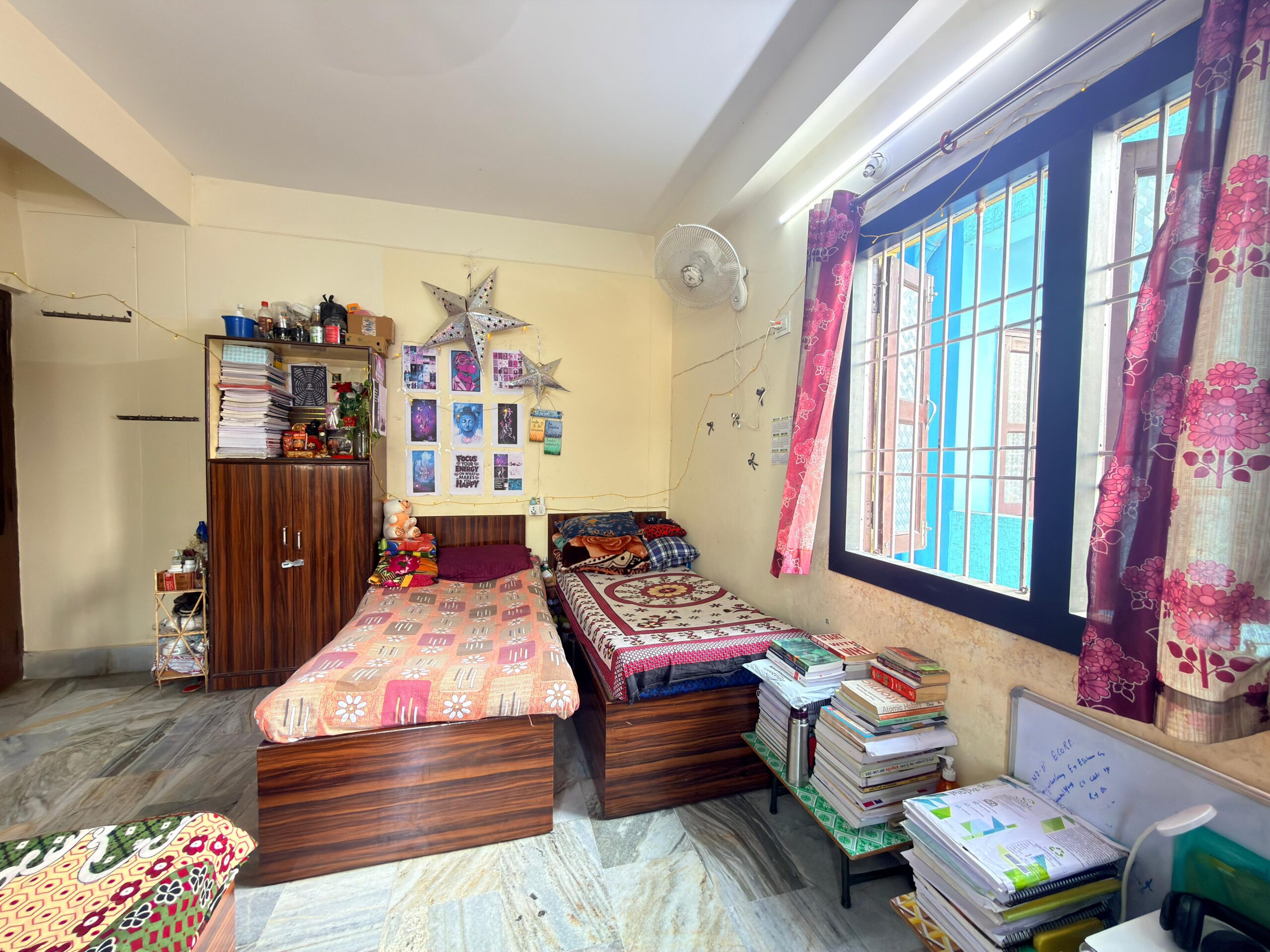 Kainaat Girls Hostel Bedroom